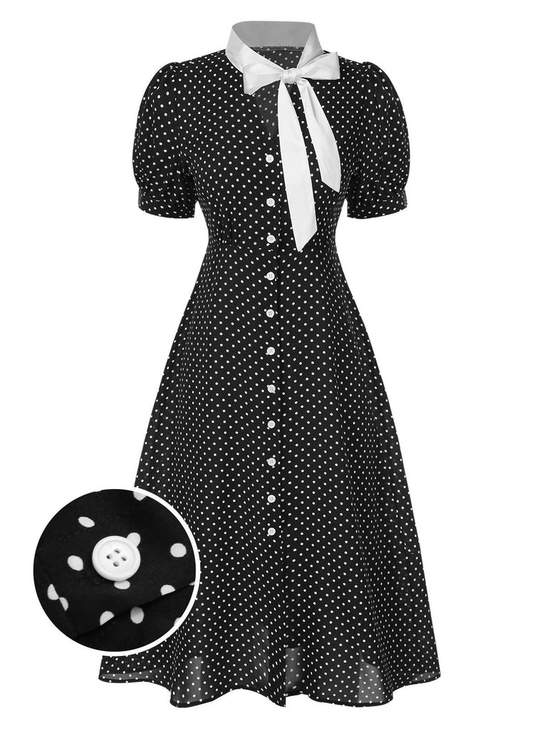 Abito a pois nodo al collo nero anni '40