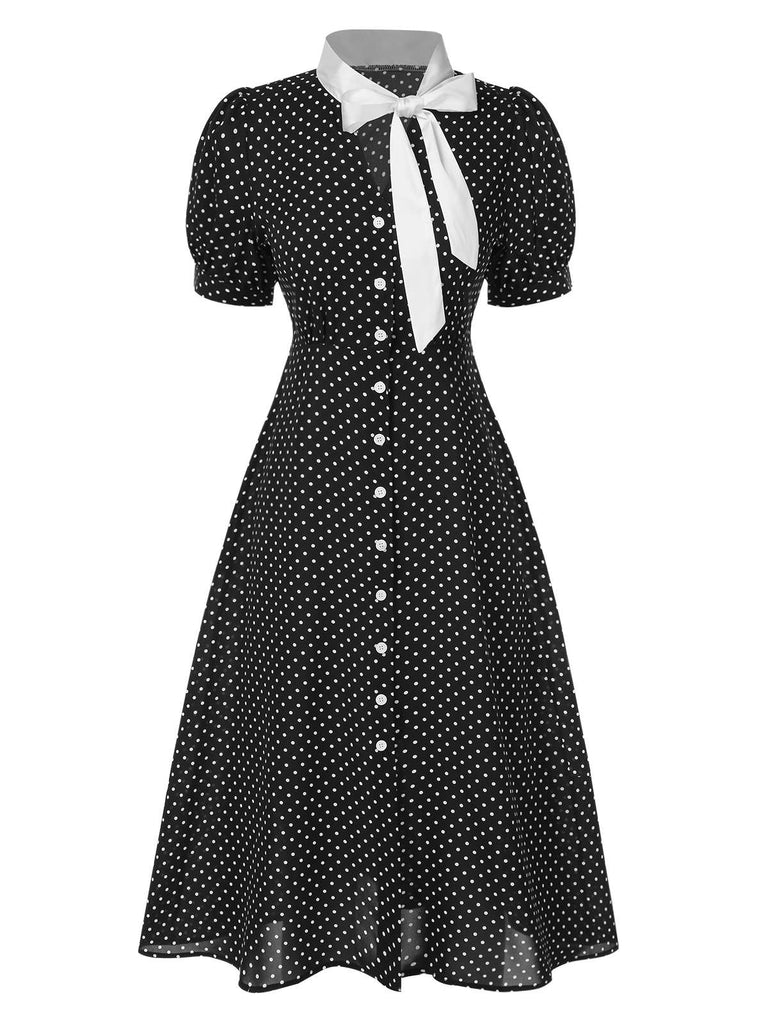 Abito a pois nodo al collo nero anni '40
