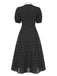 Abito a pois nodo al collo nero anni '40