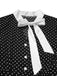 Abito a pois nodo al collo nero anni '40
