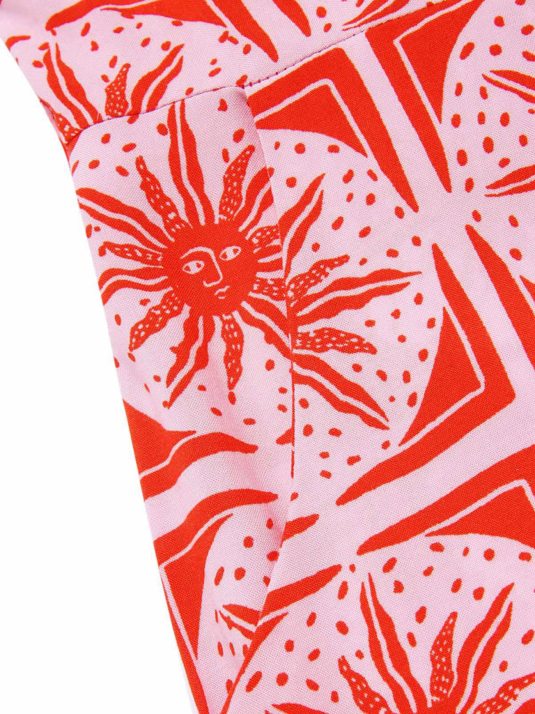 Tuta corta stampa boho sole con bottoni rosa anni '70