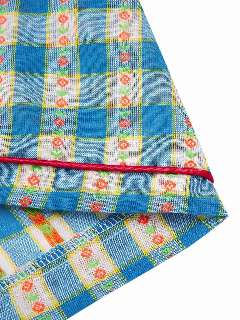 Tuta corta floreale a quadri con fiocco blu anni '50