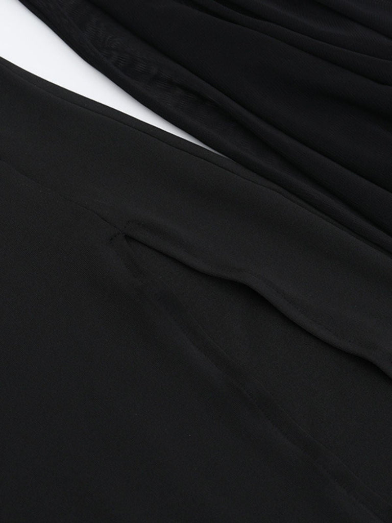 Abito gotico con spacco e maniche trasparenti nero anni '80