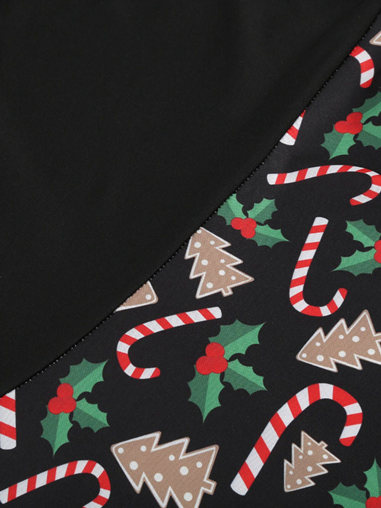 Abito stampa natalizia con scollo a V e schiena incrociata nero anni '50
