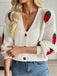Cardigan in maglia con spalle cadenti e fragole beige anni '50