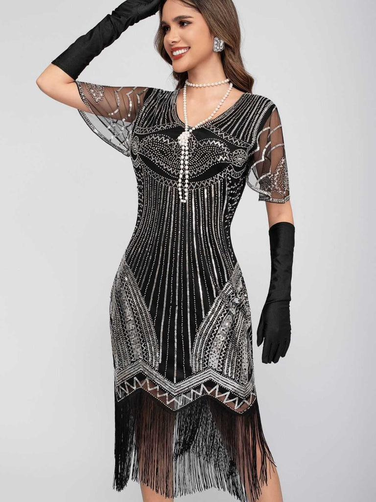 Abito Charleston nappe in paillettes  con scollo a barchetta anni '20