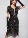 Abito flapper con frange di paillettes e scollo a barchetta anni '20