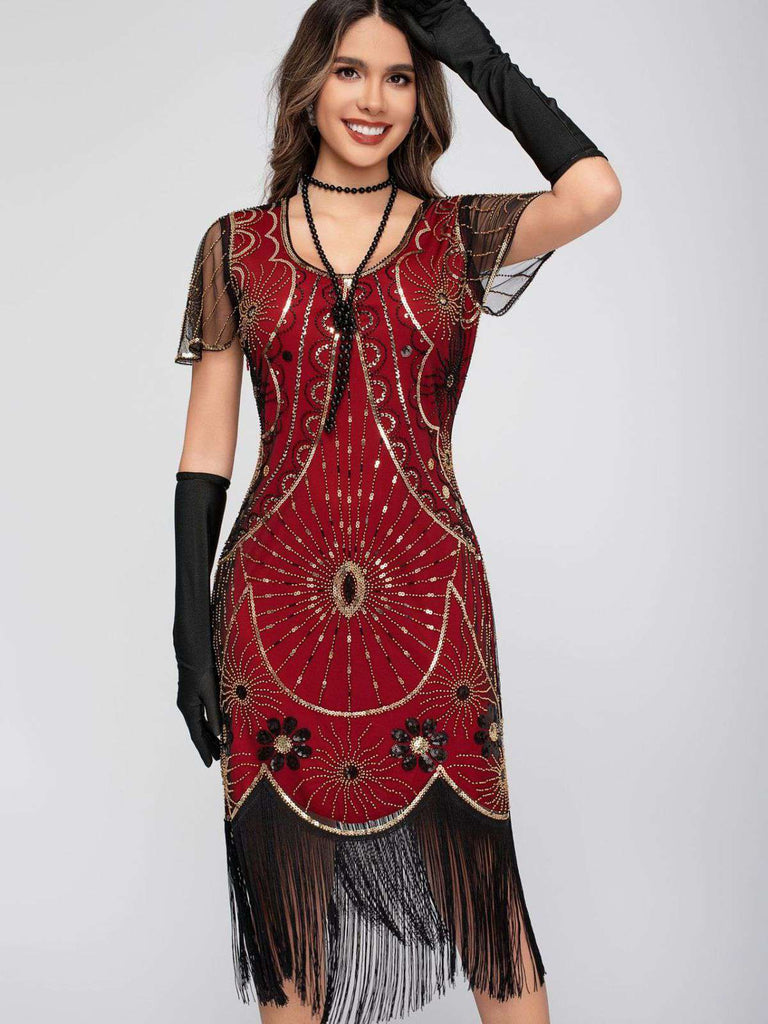 Abito flapper con frange di paillettes e scollo a barchetta anni '20