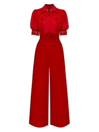 Tuta lunga con collo annodato in pizzo floreale e revers anni '50