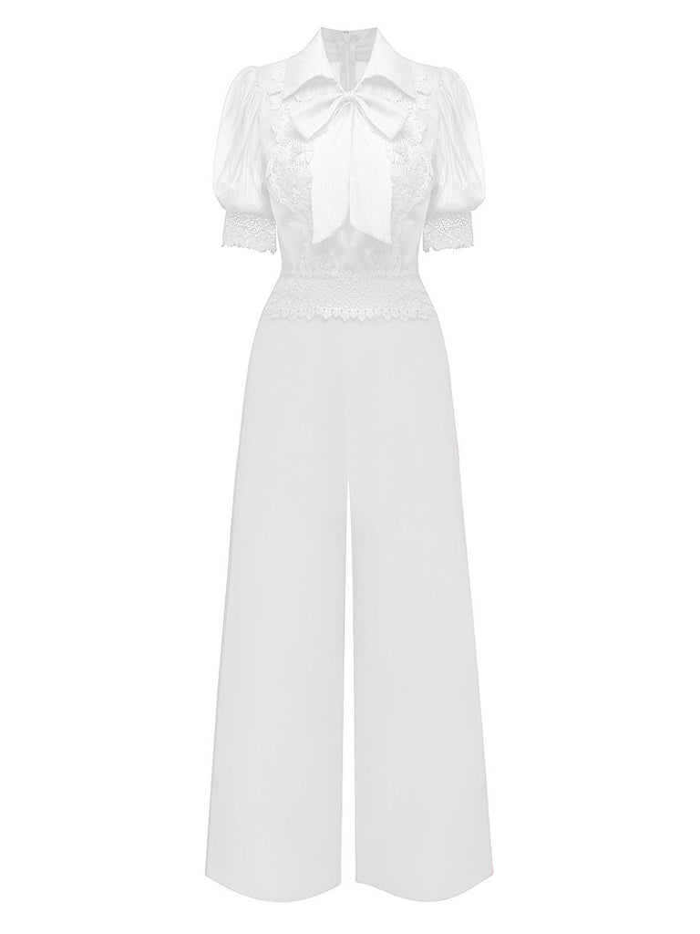 Tuta lunga con collo annodato in pizzo floreale e revers anni '50