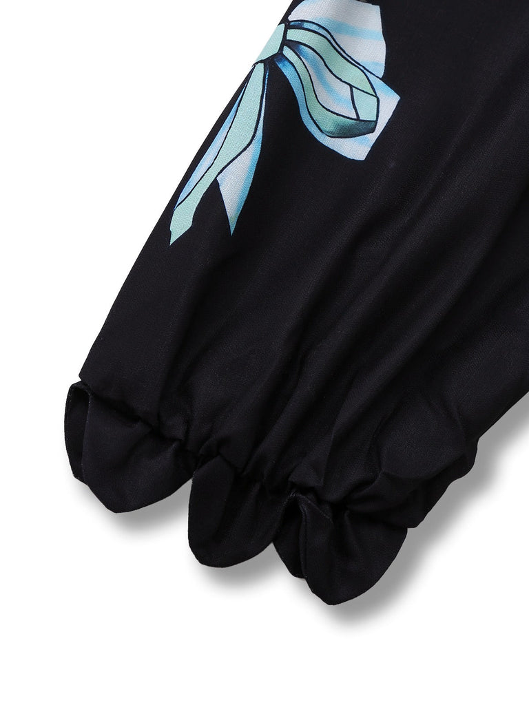 Abito con maniche a lanterna e scollo a zigzag nero anni '50