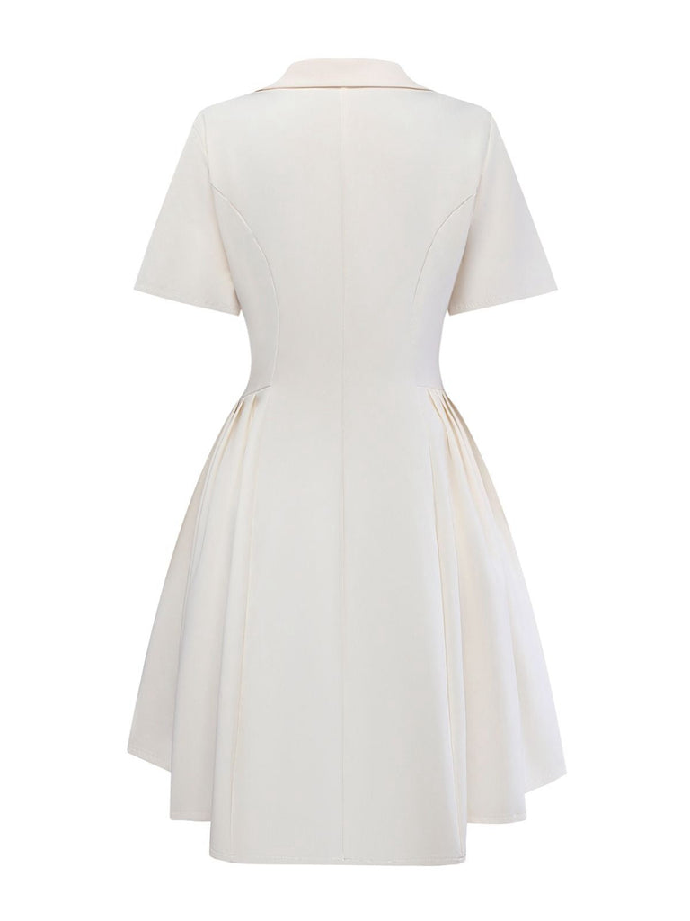 Abito a pieghe con revers doppiopetto beige anni '70