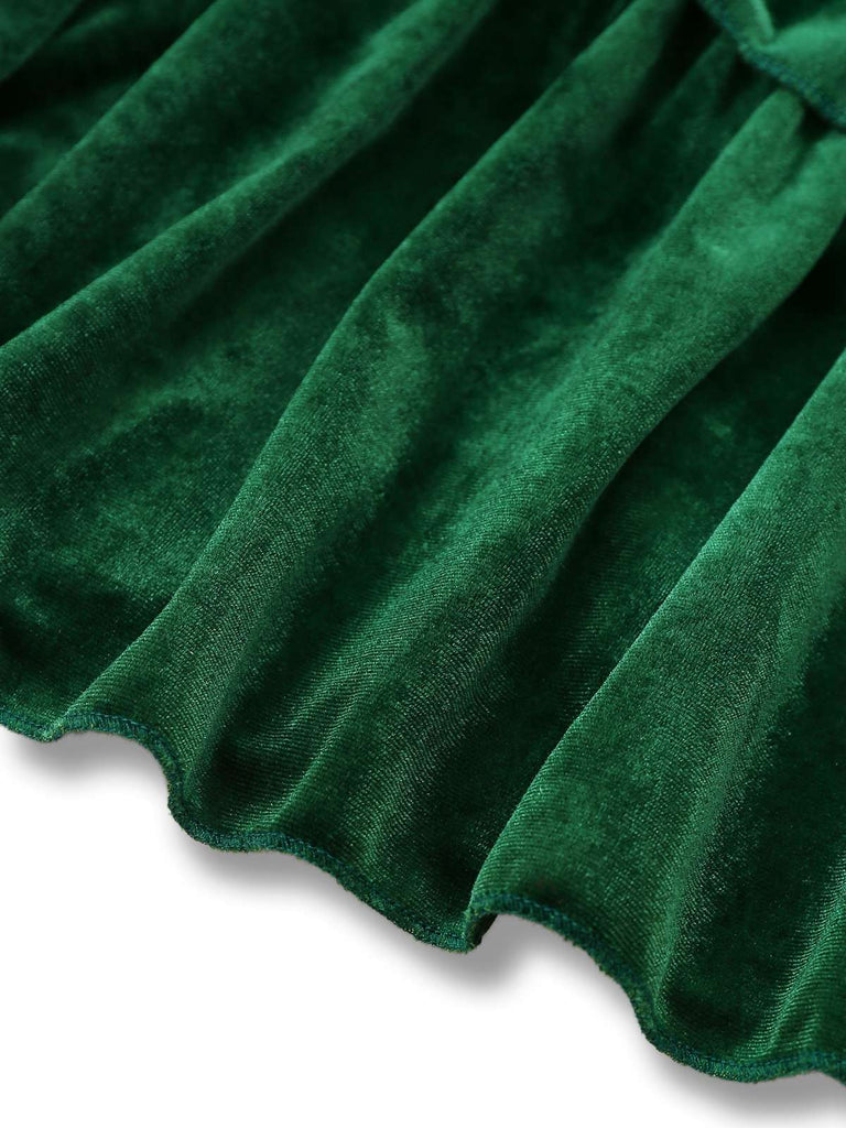 Abito a balze  in velluto con collo alto e fiocco verde anni '60