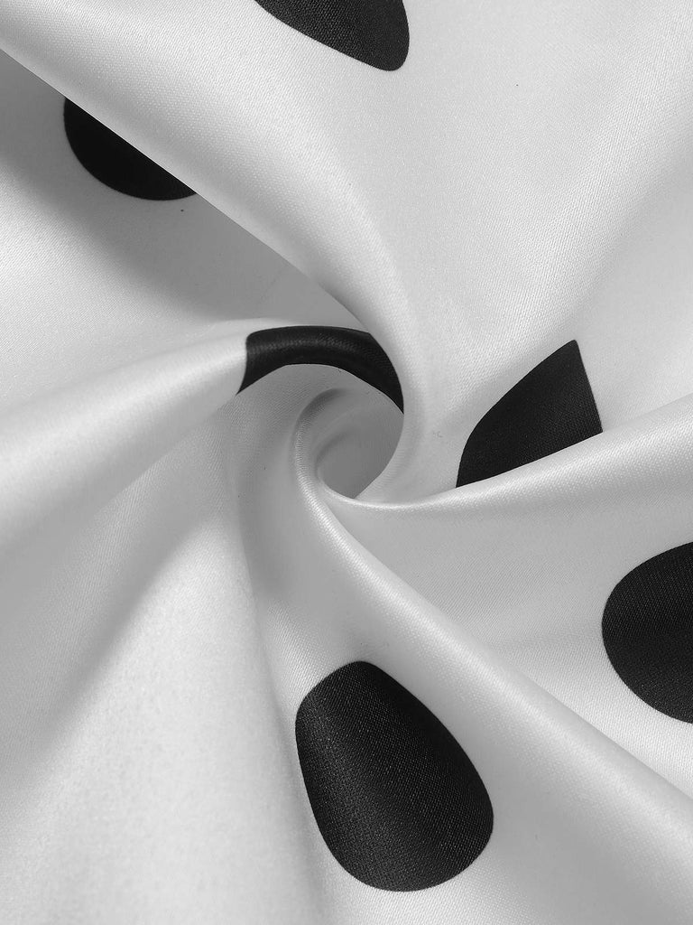 Abito a pois con scollo a V e cintura anni '50