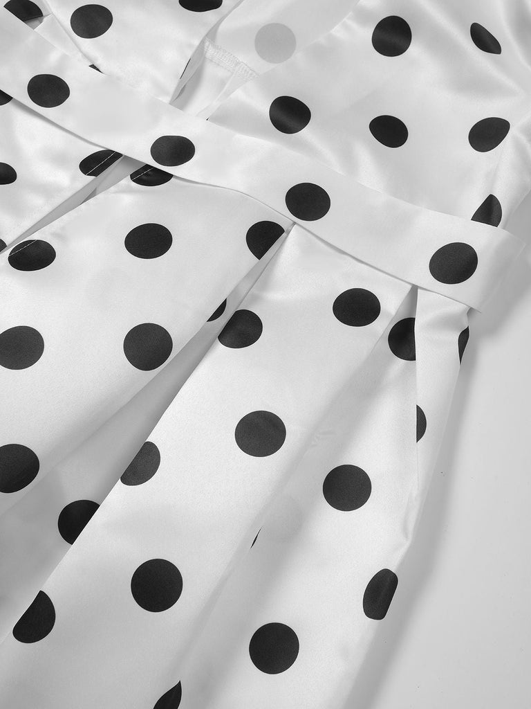 Abito a pois con scollo a V e cintura anni '50