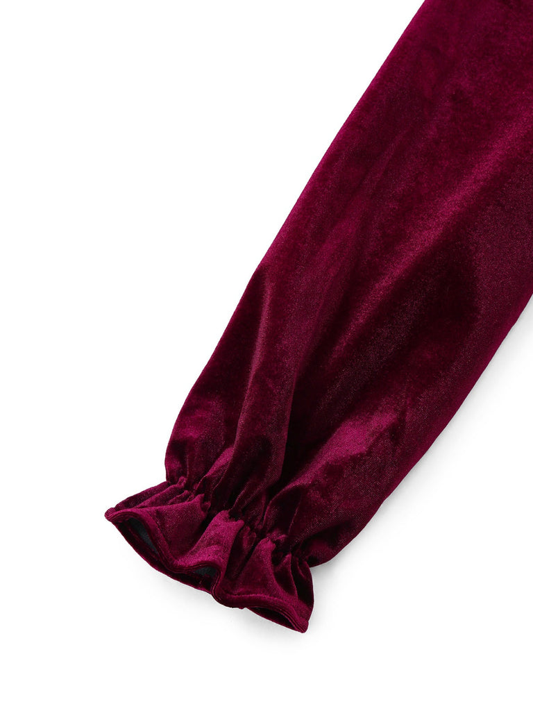 Abito in velluto con maniche a lanterna e colletto arricciato rosso anni '50