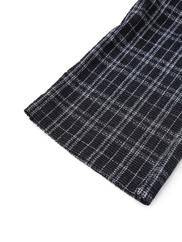 Tuta lunga in cotone a quadri con scollo a V profondo nero anni '40