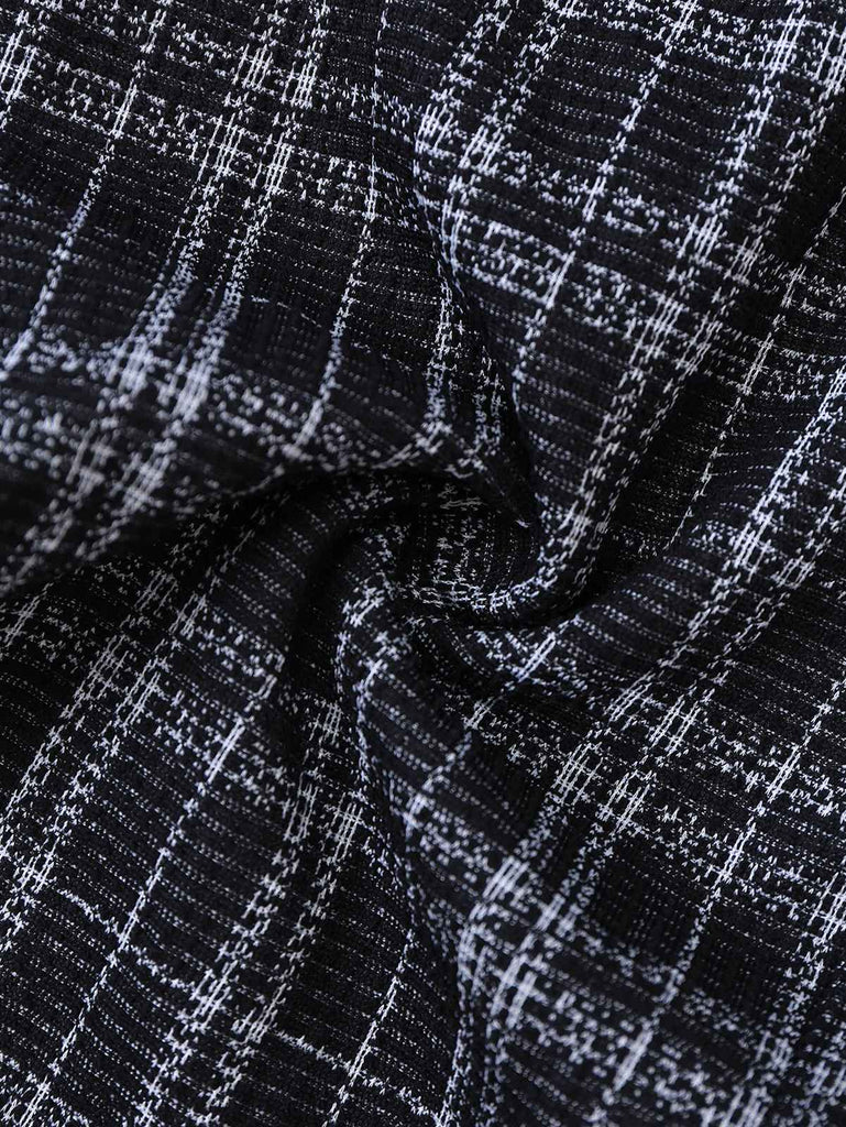 Tuta lunga in cotone a quadri con scollo a V profondo nero anni '40