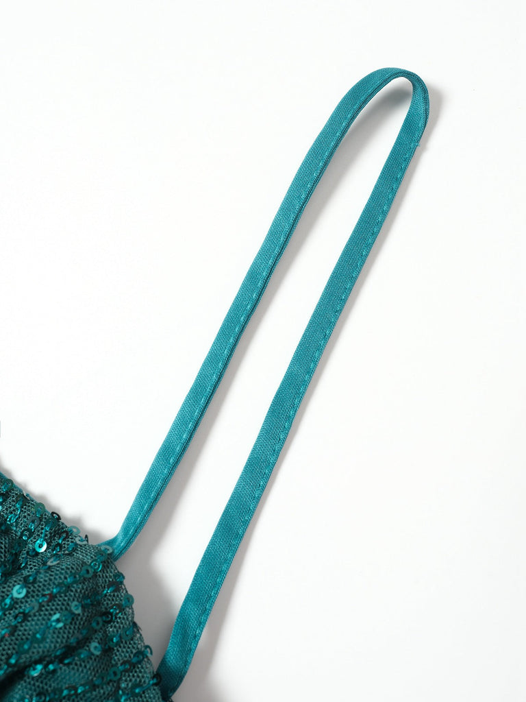 Abito con fiocco e campanellino di Natale e paillettes verde anni '60