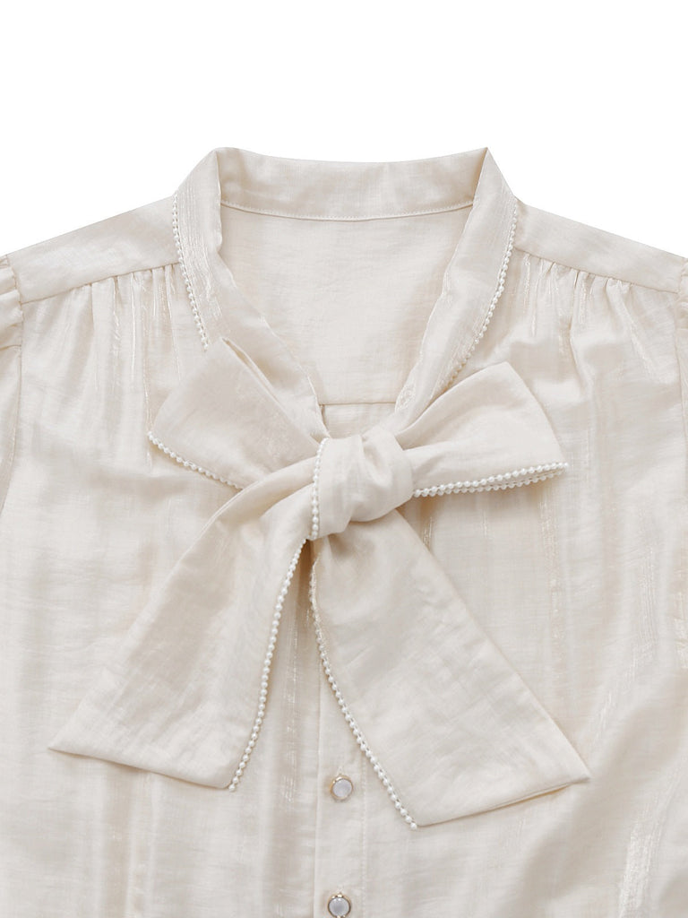 [Prevendita] Tuta lunga con fiocco al collo e perle beige anni '50