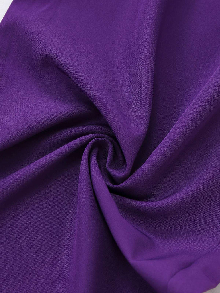 Tuta lunga attillata con maniche irregolari viola anni '80