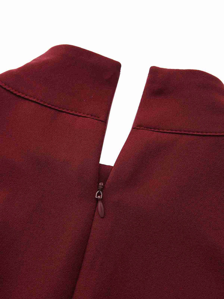 Abito con collo alto e cintura e tasca anni '40