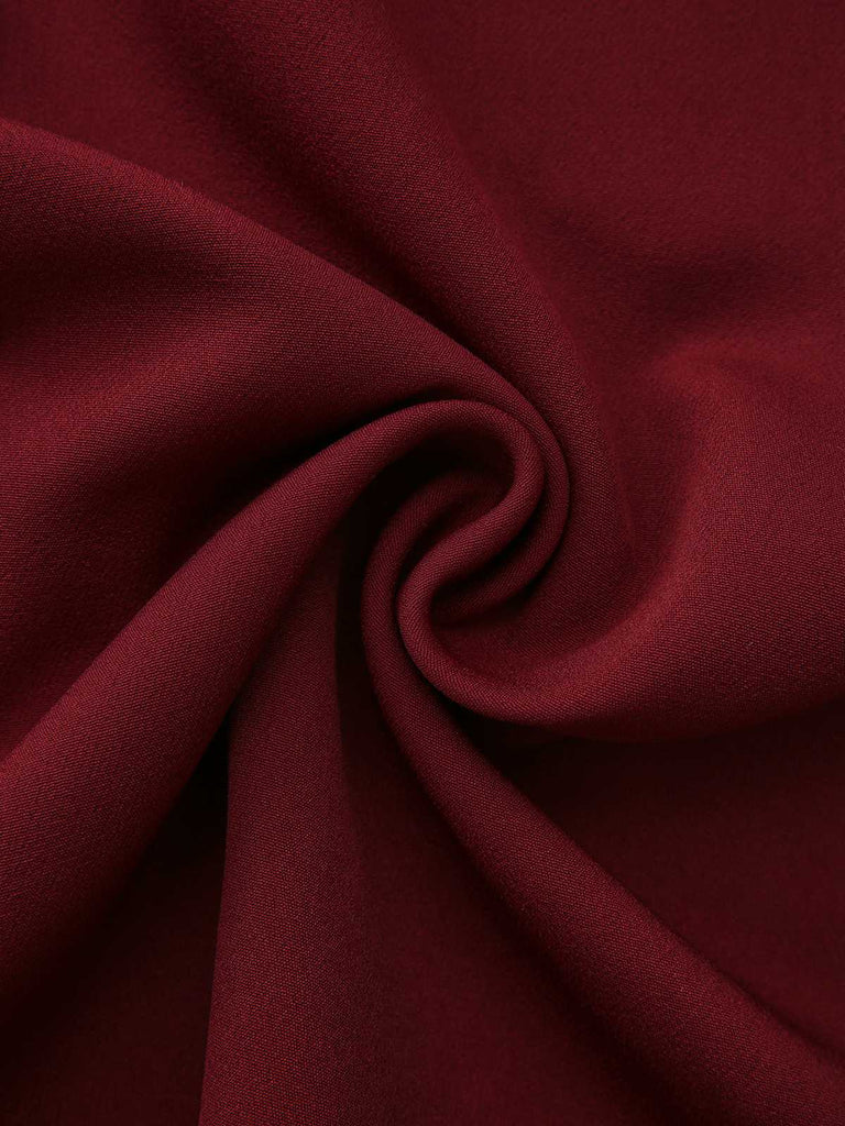 Abito con collo alto e cintura e tasca anni '40