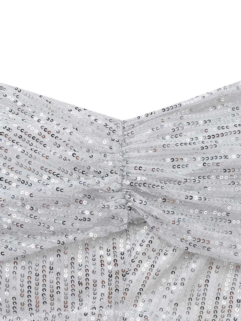 Abito monospalla con spacco laterale in paillettes argento anni '20