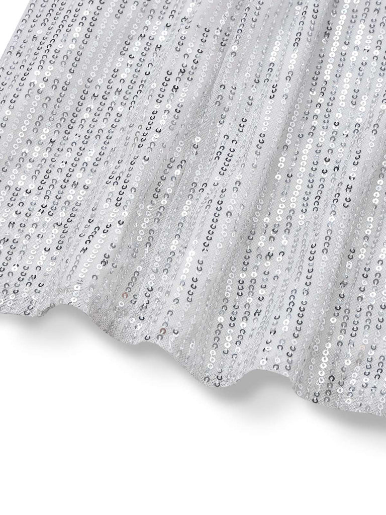 Abito monospalla con spacco laterale in paillettes argento anni '20