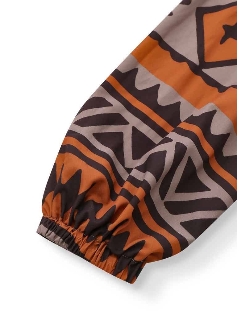 Abito boho con scollo a V profondo e stampa tribale marrone anni '70