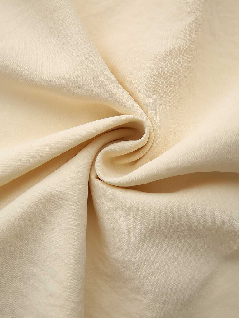 Abito con colletto a camicia e bottoni annodati in vita giallo anni '40