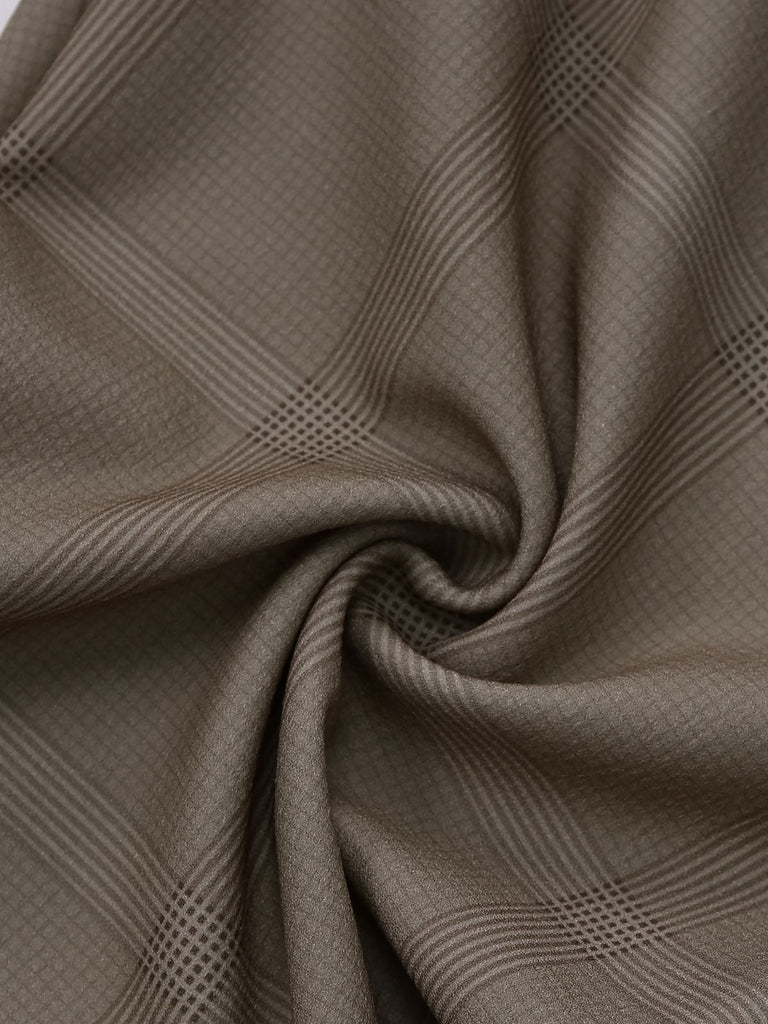 Tuta lunga a quadri con cintura e revers verde anni '30