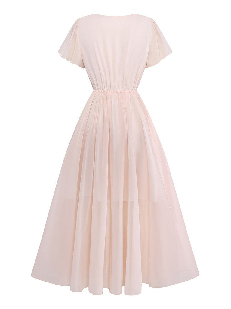 Abito floreale e maniche a balze e scollo a V rosa anni '40