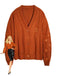 Cardigan con stelle ricamate e scollo a V arancione anni '40