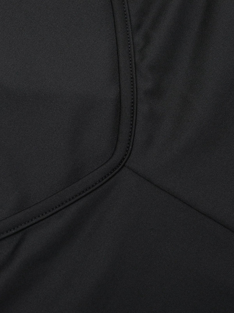 Tuta lunga svasata con scollo all'americana nero anni '80