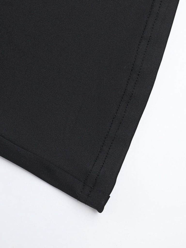 Tuta lunga svasata con scollo all'americana nero anni '80