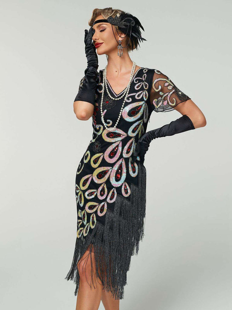 Abito flapper con frange di perline e paillettes a pavone nero anni '20