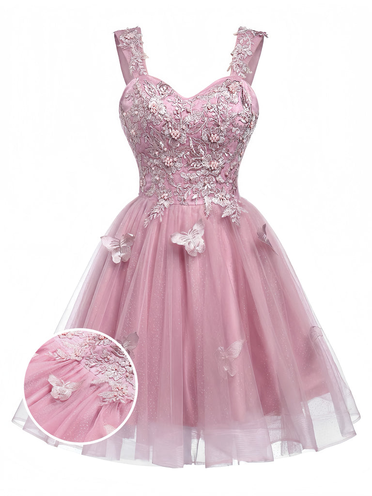 Miniabito Homecoming rosa anni '60 in tulle glitterato con farfalle