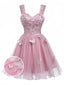 Miniabito Homecoming rosa anni '60 in tulle glitterato con farfalle