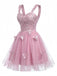 Miniabito Homecoming rosa anni '60 in tulle glitterato con farfalle