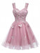 Miniabito Homecoming rosa anni '60 in tulle glitterato con farfalle