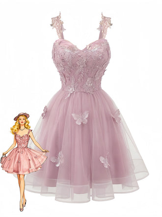 Miniabito Homecoming rosa anni '60 in tulle glitterato con farfalle