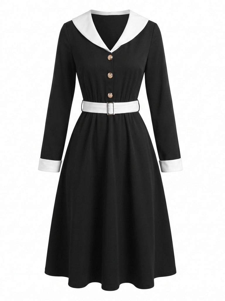 Abito anni '50 nero e bianco con revers e scollo a V e maniche lunghe