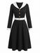 Abito anni '50 nero e bianco con revers e scollo a V e maniche lunghe