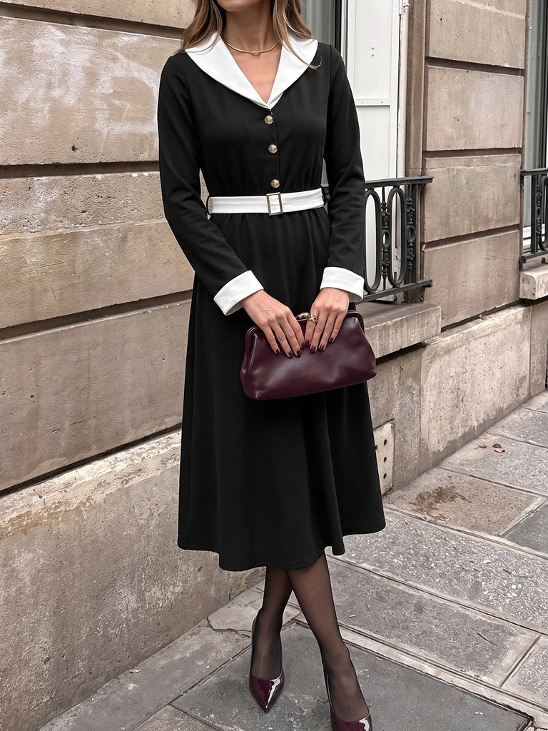 Abito anni '50 nero e bianco con revers e scollo a V e maniche lunghe 2