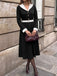 Abito anni '50 nero e bianco con revers e scollo a V e maniche lunghe 2