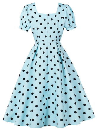 Abito swing anni '50 blu a pois con scollo quadrato e maniche a sbuffo 2