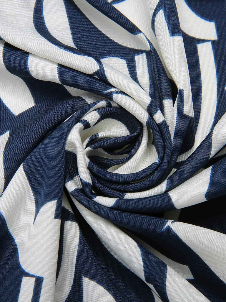 Abito stampa geometrica con scollo a V blu navy anni '30