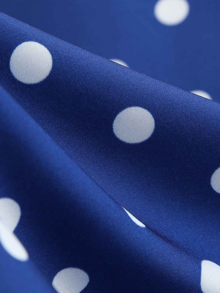 Abito a pois con maniche a cappuccio e cintura anni '50