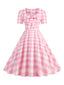Abito a ruota pois fiocco a cuore rosa pallido anni '50